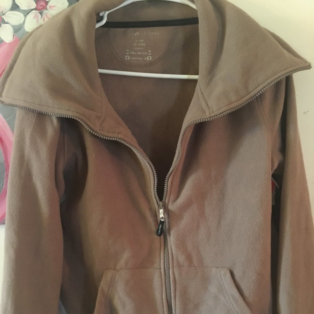 Store is closed 
Calvin Klein medium fleece jacket NWT